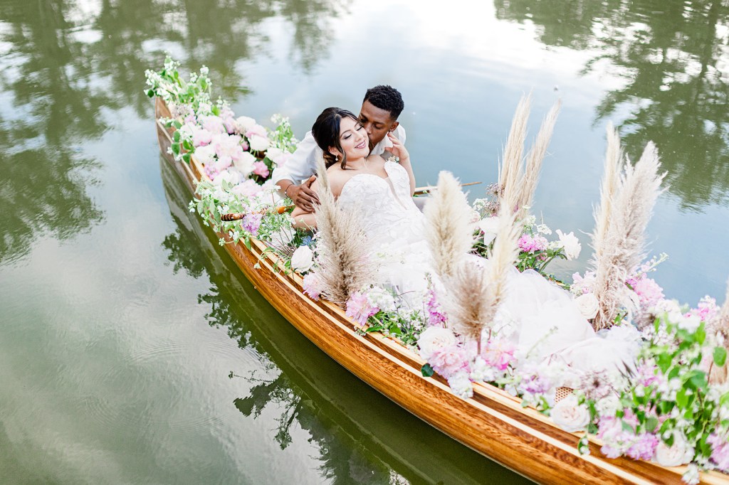 canoe decorated for bride and groom