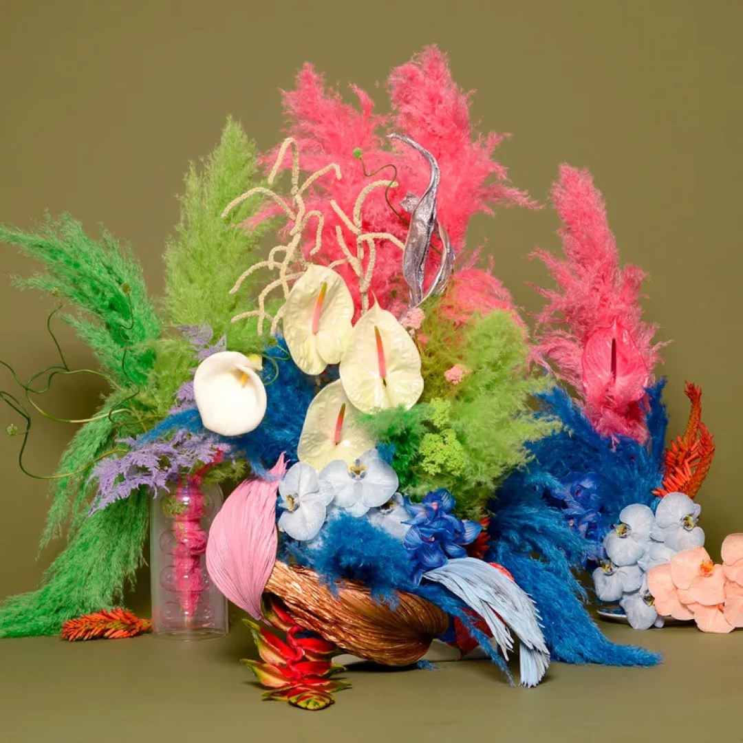 brrch flowers bouquet of colourful flowers and feathers against green background brrch flowers bouquet of colourful flowers and feathers against green background