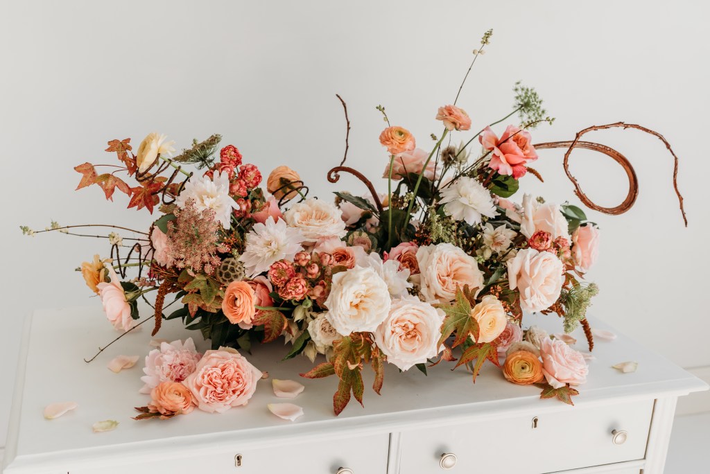 Rustic centerpiece by Remingtons Flowers Katie Emanuelson Photography