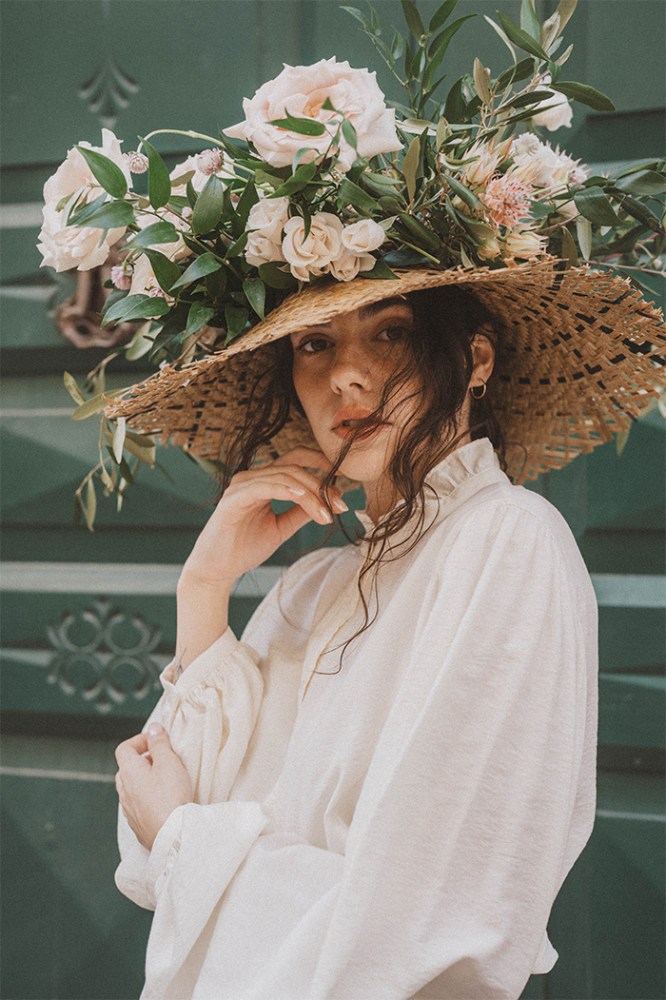 women in a flower hat