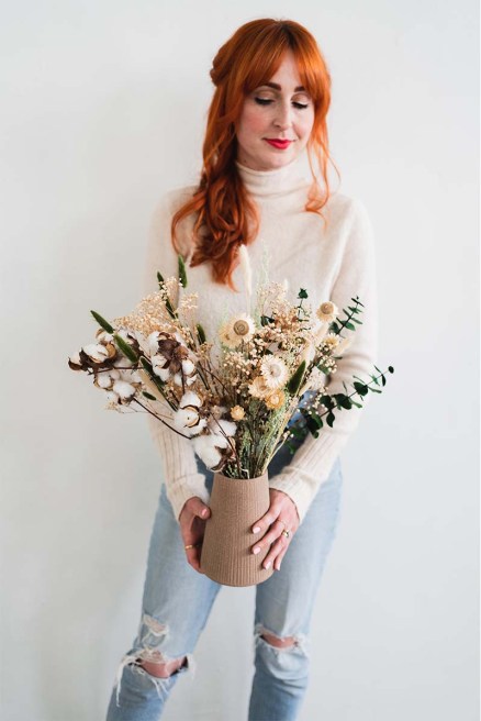 Meg Blancato from Native Poppy holding a dried design