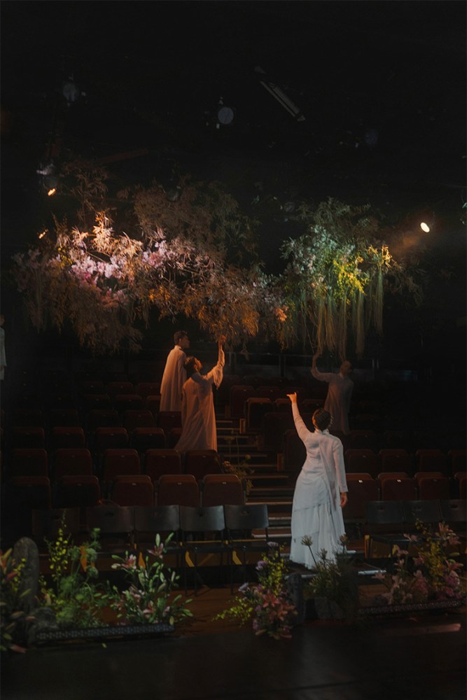 stage with hanging flowers