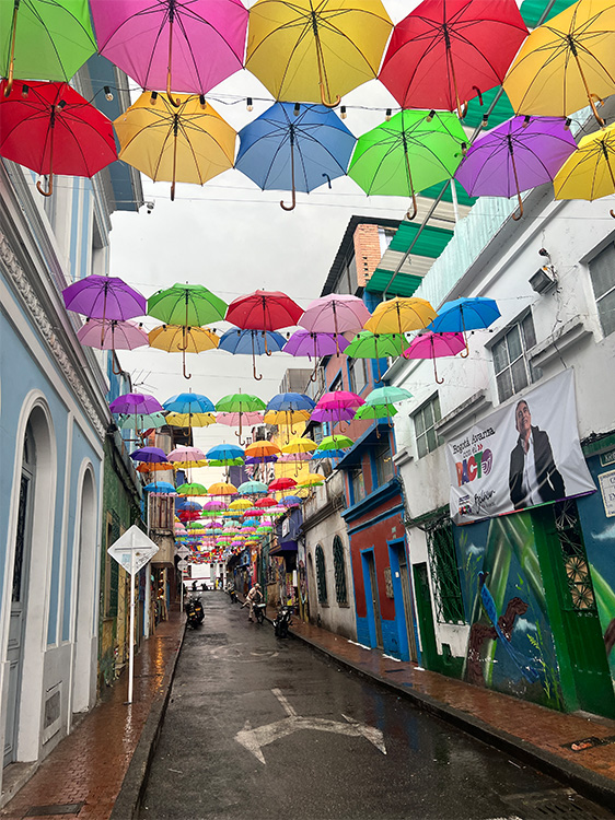 colorful street in Bogota with umbrellas