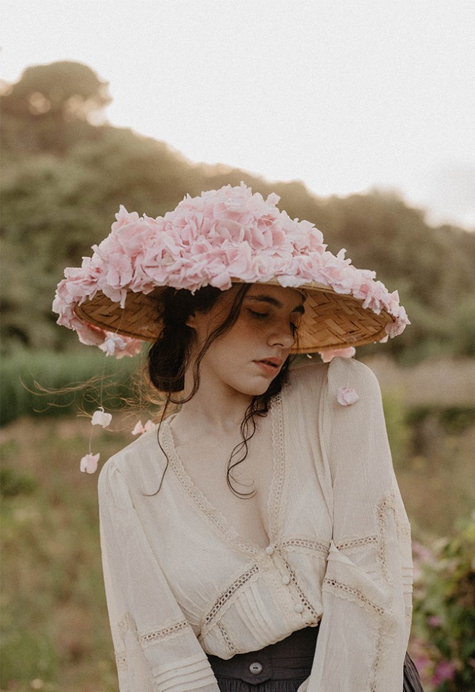 women in floral hat